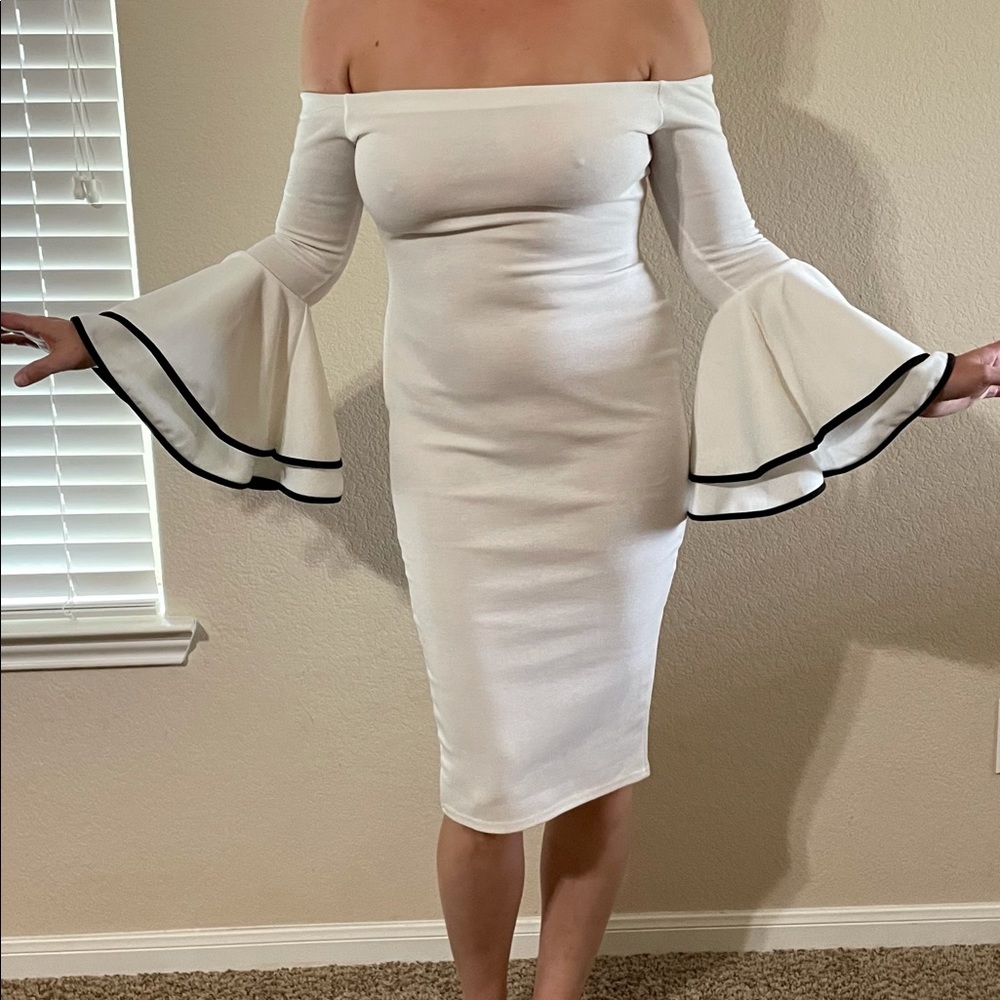 Tea length, off the shoulder, ruffle sleeve dress!